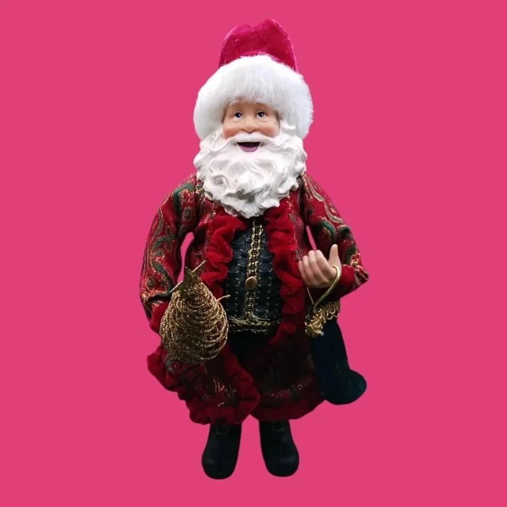 Vintage santa holding gold tree and boot